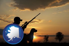 a hunter and a dog at sunset - with AK icon