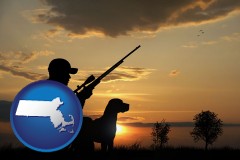 massachusetts map icon and a hunter and a dog at sunset