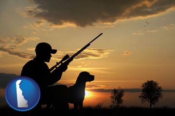 a hunter and a dog at sunset - with Delaware icon